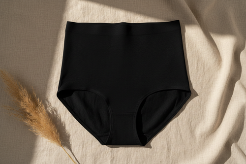 Black high-waisted absorbent brief, front view